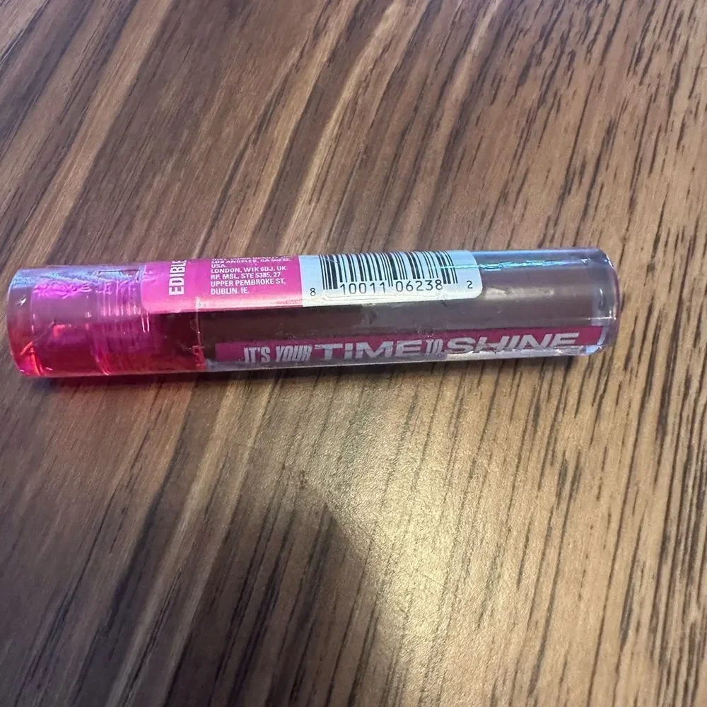 Sharon C Uoma edible lipgloss brown made in Italy